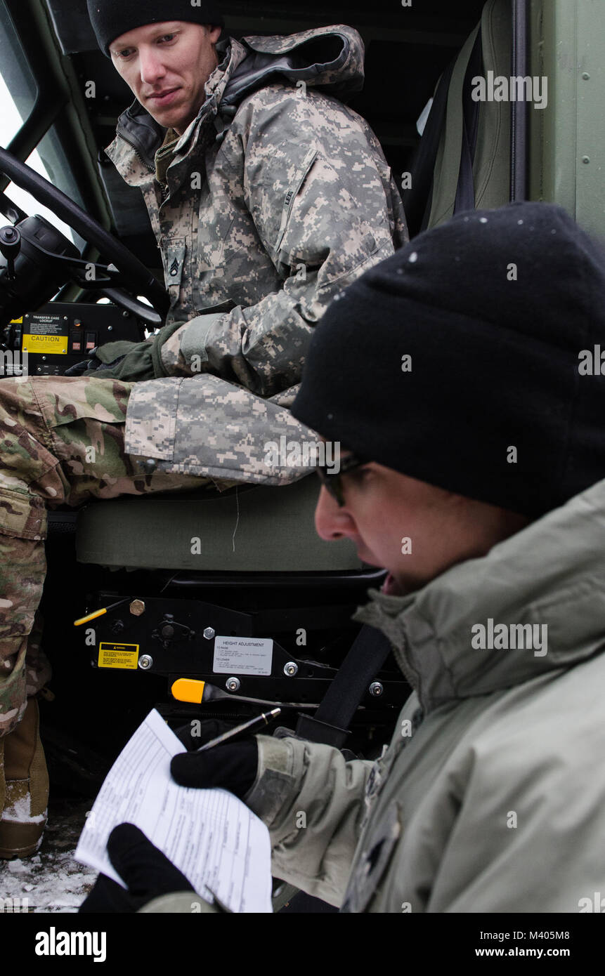 Advanced Leader Course ammunition specialists conducted a mock inspection with Task Force Triad, Operation Cold Steel II, ammunition specialists of palletized load systems, Feb. 5, 2018 at Fort McCoy, Wis. This inspection was conducted to give the ALC students an idea of how the PLS is inspected when drawing ammunition and to prepare OCSII Soldiers for their first draw. Operation Cold Steel is the U.S. Army Reserve’s crew-served weapons qualification and validation exercise to ensure America’s Army Reserve units and Soldiers are trained and ready to deploy on short-notice as part of Ready Forc Stock Photo