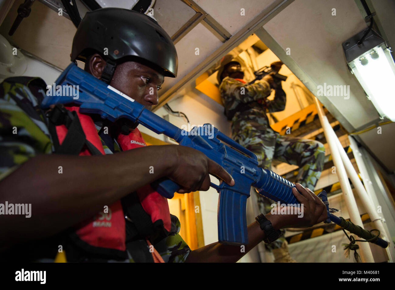180206-N-KP948-164   DJIBOUTI (Feb. 6, 2018) Members of the Kenya Navy participate in a visit, board, search and seizure (VBSS) drill during exercise Cutlass Express 2018. Cutlass Express is designed to improve cooperation, maritime domain awareness and information sharing practices to increase capabilities between the U.S., East African and Western Indian Ocean nations. (U.S. Navy photo by Mass Communication Specialist 2nd Class Alyssa Weeks) Stock Photo