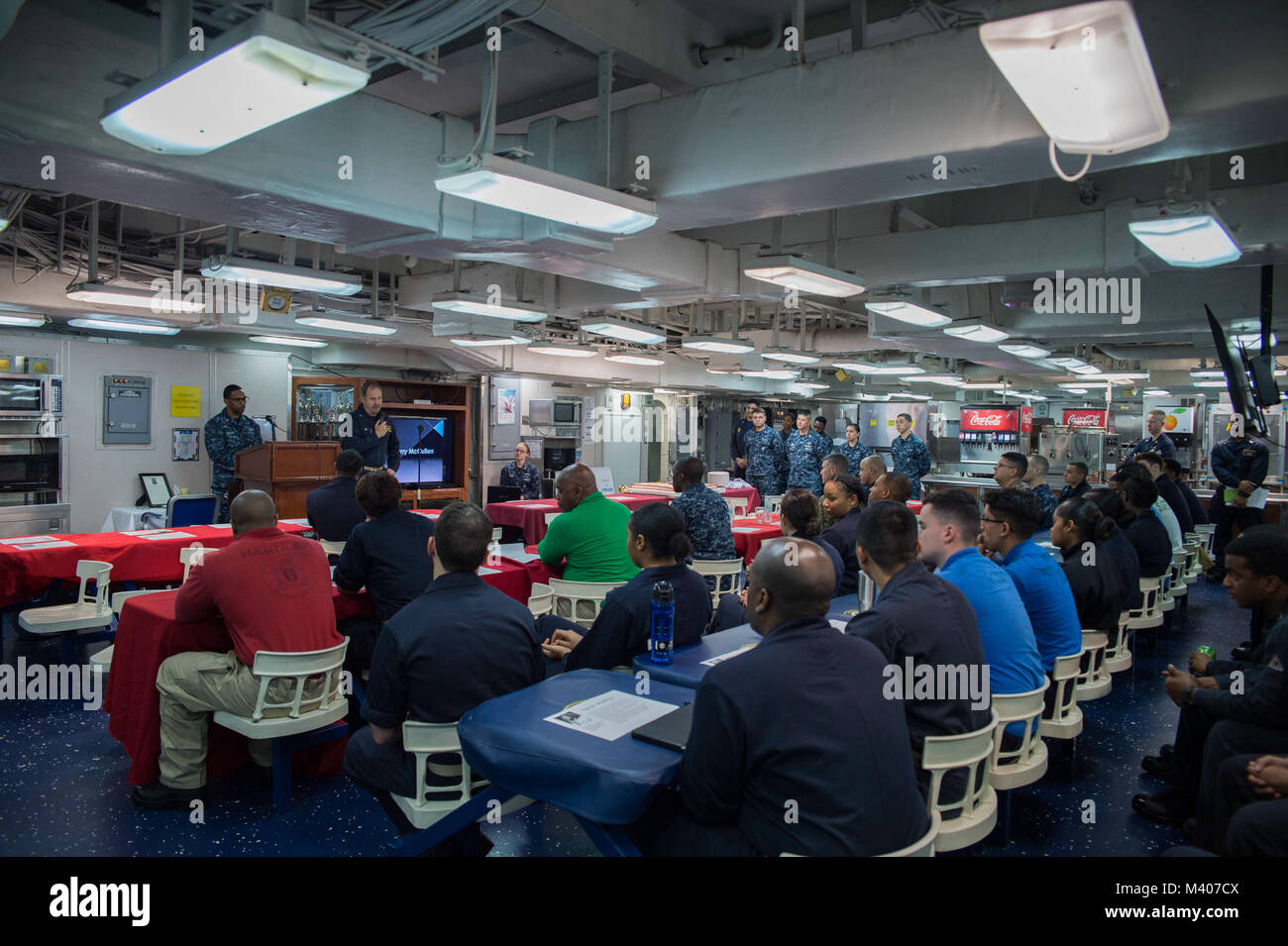 180207-N-NB544-056  SOUTH CHINA SEA  (Feb. 7, 2018) Capt. Larry McCullen, commanding officer of the amphibious assault ship USS Bonhomme Richard (LHD 6), delivers closing remarks during an African American/Black History Month celebration on the ship’s mess decks. Bonhomme Richard is operating in the Indo-Asia-Pacific region as part of a regularly scheduled patrol and provides a rapid-response capability in the event of a regional contingency or natural disaster. (U.S. Navy photo by Mass Communication Specialist 2nd Class Kyle Carlstrom/Released) Stock Photo