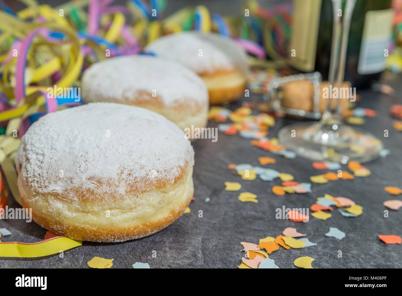 Carnival Donut with carnival decoration on a slate Stock Photo
