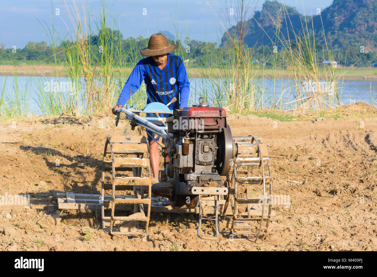 Hpa-An: Thanlwin (Salween) River, field, farmer, Two-wheel tractor ...