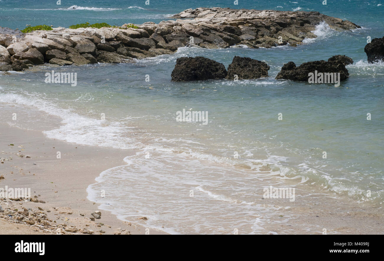 White sandy beaches in Montego Bay, Jamaica. Lots of vegetation and ocean views. Island life at its finest, picturesque, and no people in the photos. Stock Photo