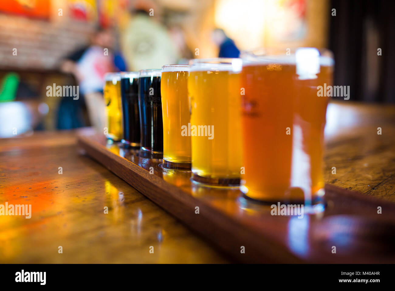 A variety set of craft beers light and dark on the table Stock Photo