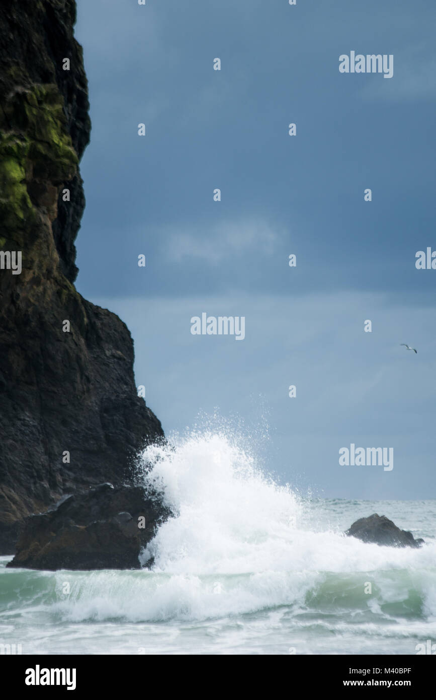 The Rocky Outcroppings of Cannon Beach, Oregon on the pacific northwest coast. Featured in a scene of the popular movie 'The Goonies' Stock Photo