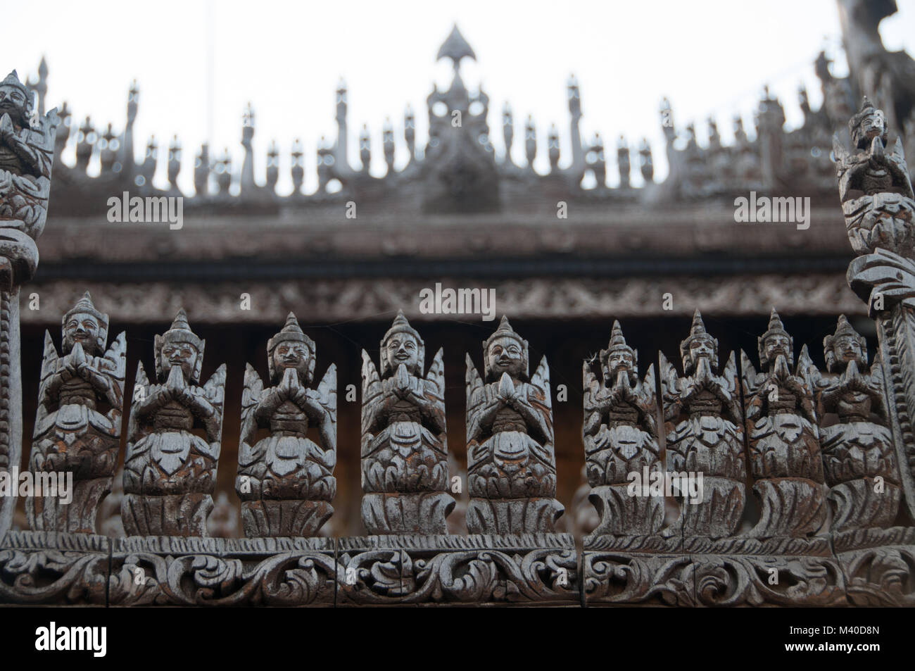 Teakwood carvings on Shwenandaw Monastery, Mandalay, Myanmar Stock Photo