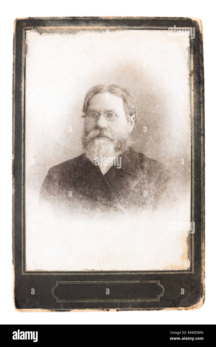 retro antique photo early twentieth century. vintage photograph,  portrait old man with beard and moustache with glasses 1900s 20th century Stock Photo