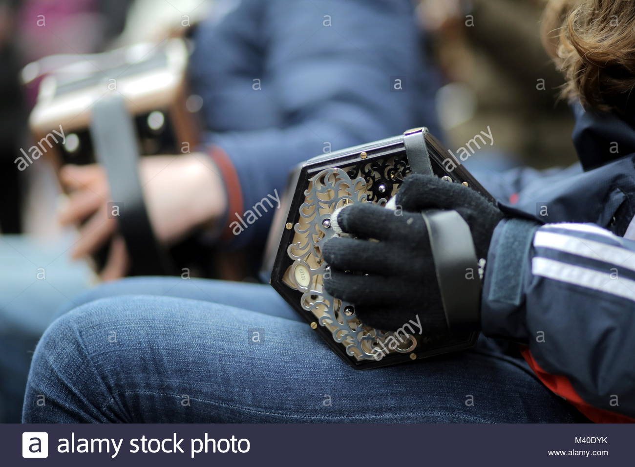 Traditional Irish musicians play music in Grafton Street Dublin at the start of a St Patrick's weekend. Stock Photo