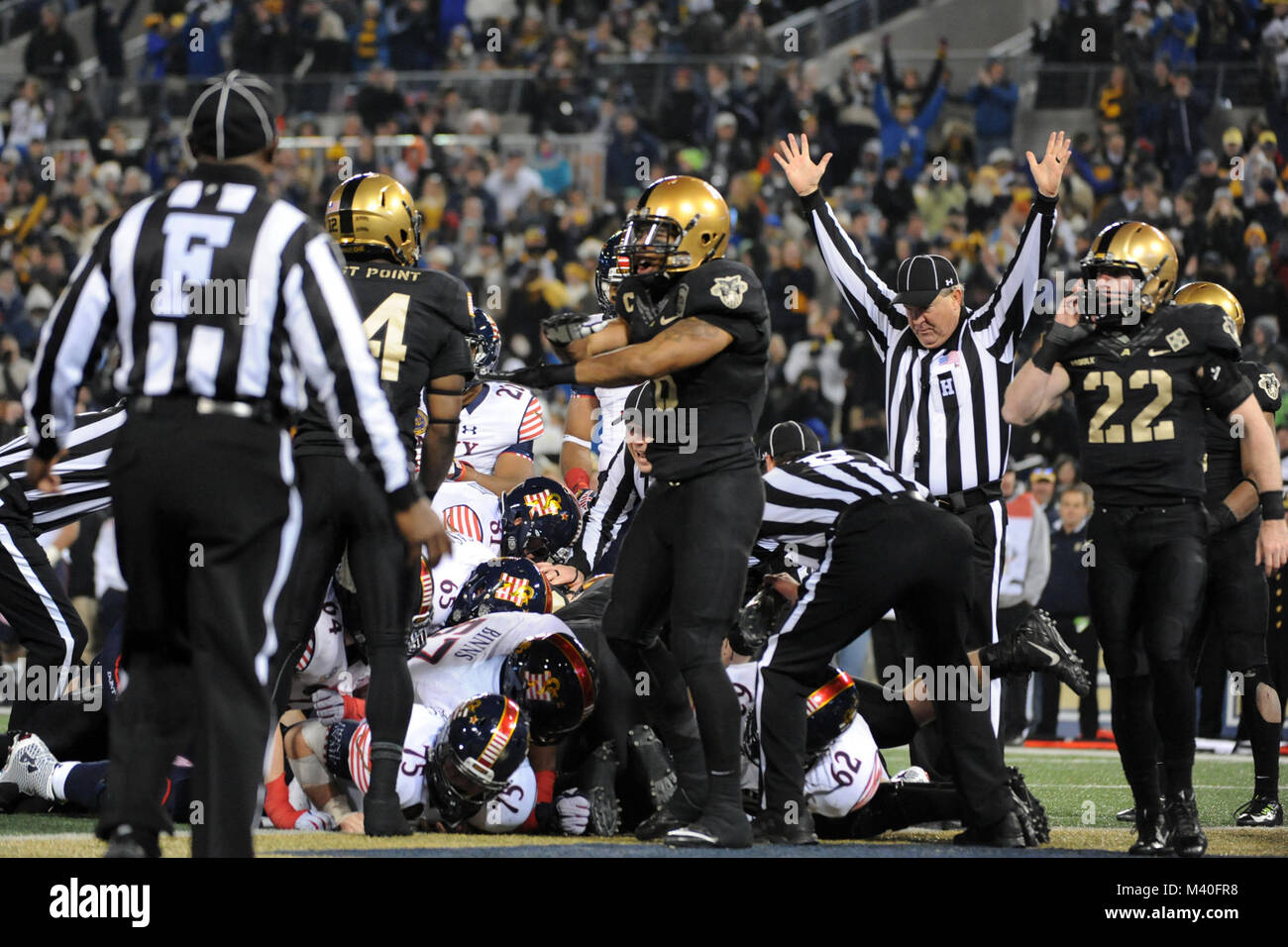 A referee signals touchdown after Navy quarterback Keenan Reynolds