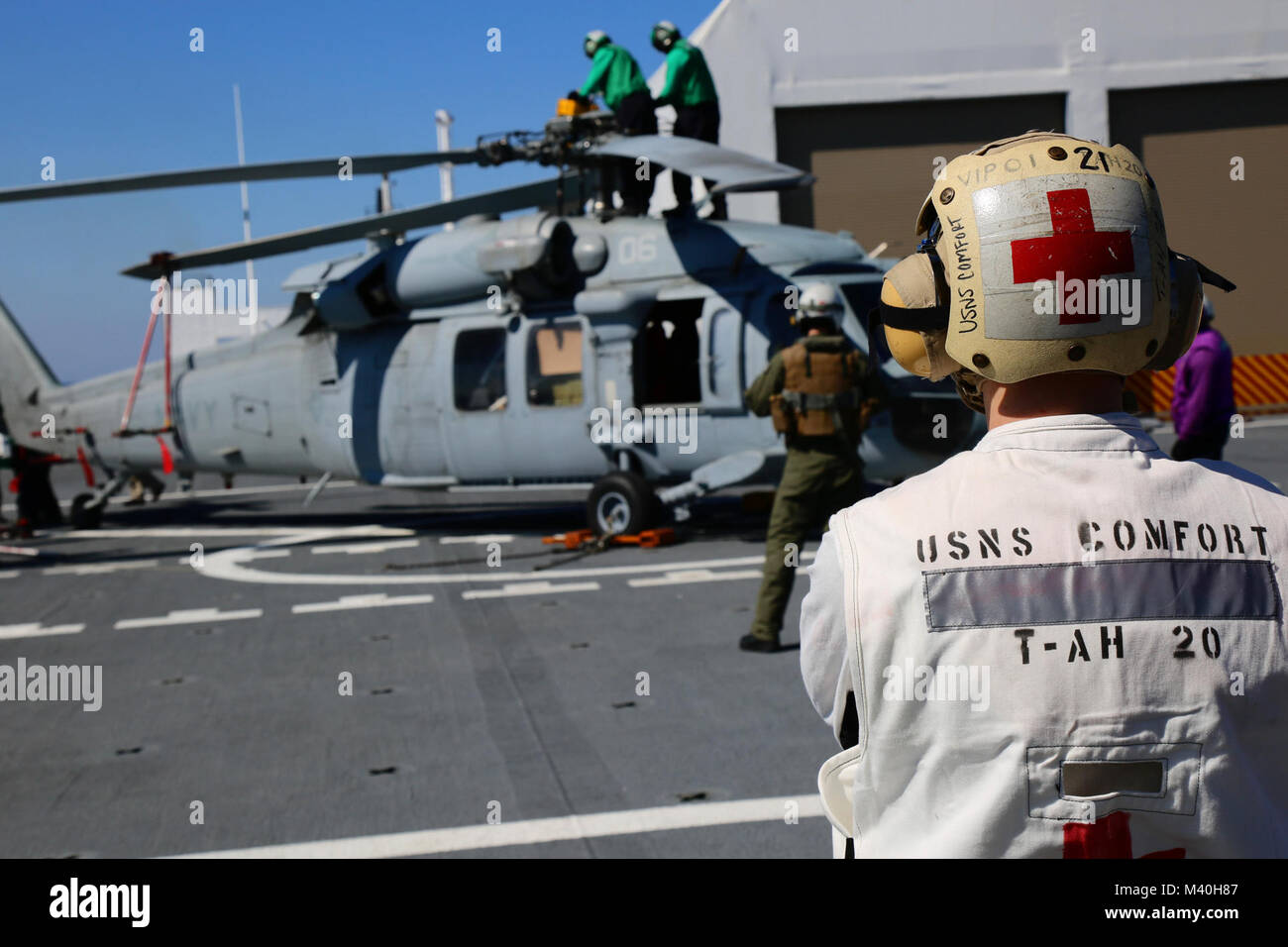 150401-A-ZA034-093 (April 2, 2015) ATLANTIC OCEAN- Sailors assigned to Helicopter Combat Support Squadron 22 'Sea Knights”, conduct flight operations aboard USNS Comfort (T-AH 20) during Continuing Promise 2015 (CP-15). CP-15 is a U.S. Southern Command-sponsored and U.S. Naval Forces Southern Command/U.S. 4th Fleet-conducted deployment to conduct civil-military operations including humanitarian-civil assistance, subject matter expert exchanges, medical, dental, veterinary and engineering support and disaster response to partner nations and to show U.S. support and commitment to Central and Sou Stock Photo