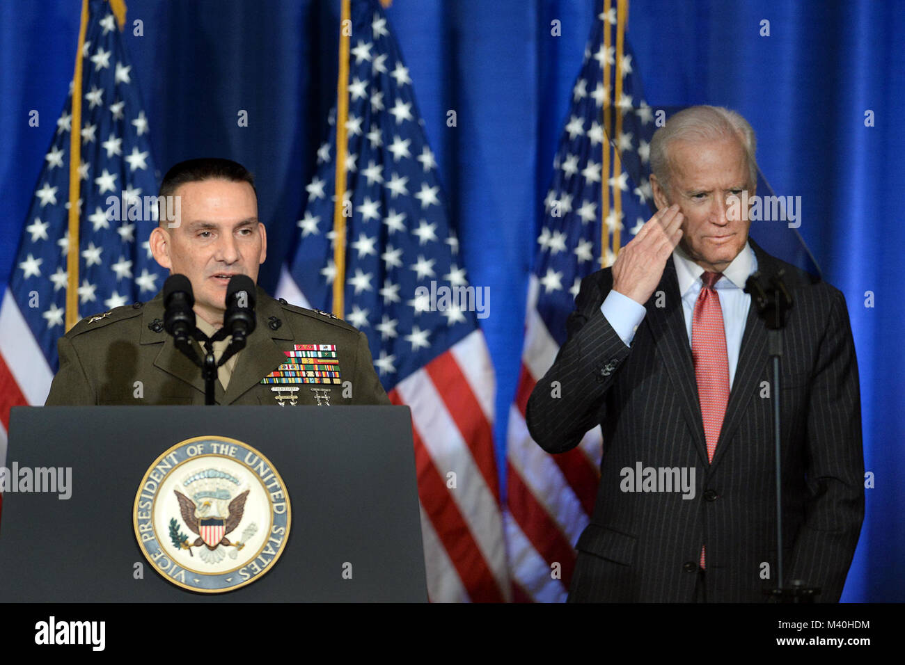 Vice President Joe Biden Salutes As He Is Introduced By Marine Maj Gen Frederick M Padilla President Of National Defense University At Fort Mcnair In Washington D C April 9 2015 Biden Spoke