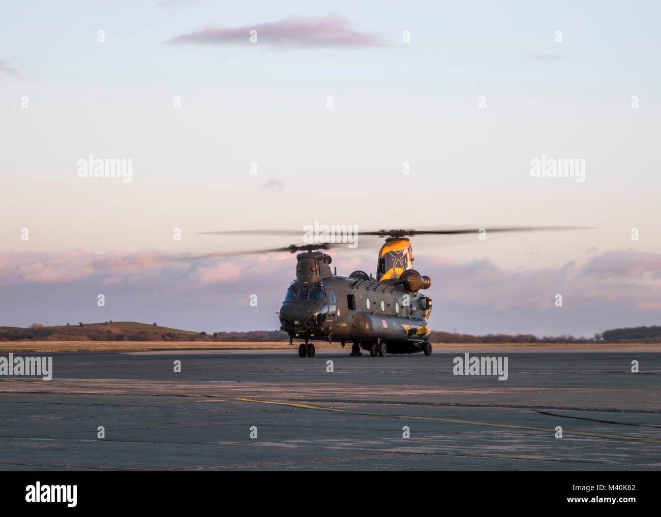 a-boeing-chinook-helicopter-of-28-squadron-raf-on-the-ground-at-night