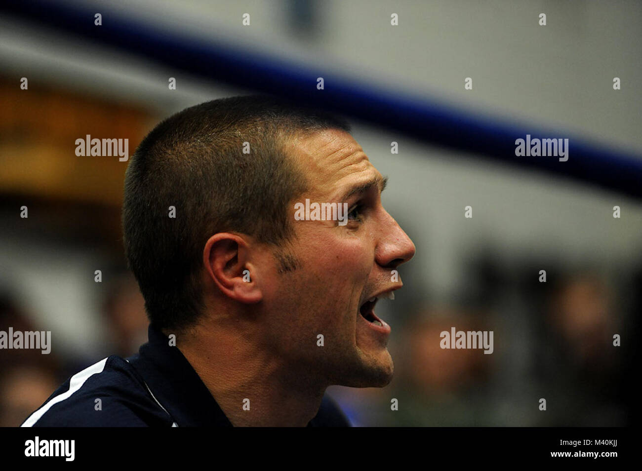 U S Air Force Academy Boxing Coach Capt Blake Baldi Yells Instructions From The Corner At Cadet Second Class Mike Leland Face During His Bout Against U S Army West Point Cadet Jackson Matheson