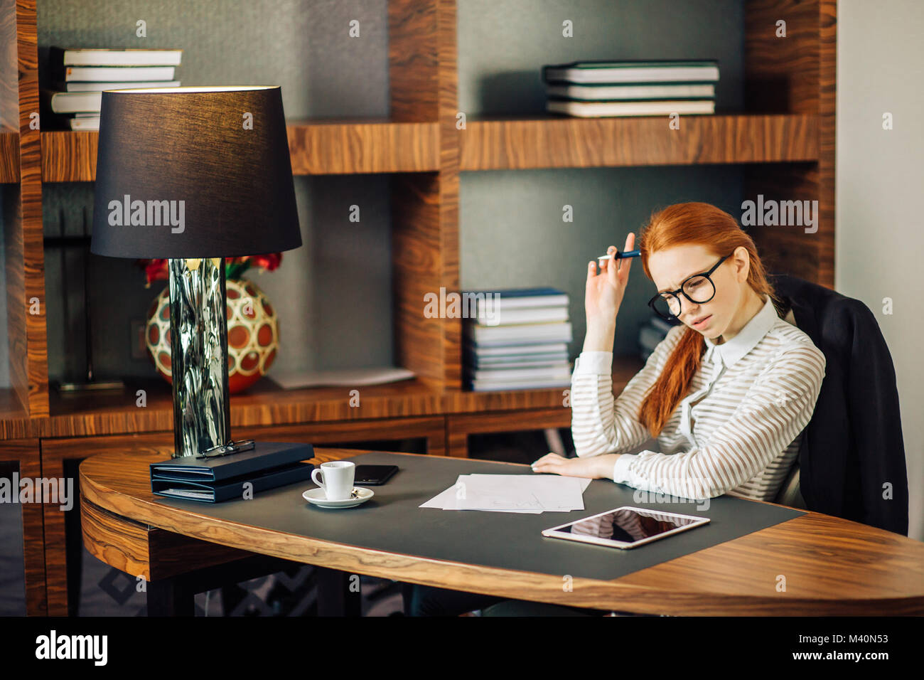young businesswoman using tablet computer Stock Photo