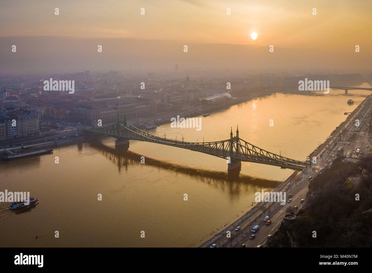 Budapest, Hungary - Aerial view of Liberty Bridge (Szabadsag Hid) over River Danube at sunrise on a beautiful winter morning Stock Photo