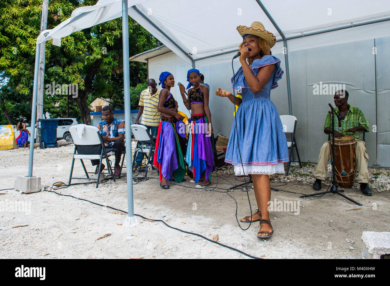 150918-N-NK134-204 PORT AU PRINCE, Haiti (Sept. 18, 2015) - A local band performs at a medical site established at Killick Coast Guard Station in support of Continuing Promise 2015. Continuing Promise is a U.S. Southern Command-sponsored and U.S. Naval Forces Southern Command/U.S. 4th Fleet-conducted deployment to conduct civil-military operations including humanitarian-civil assistance, subject matter expert exchanges, medical, dental, veterinary and engineering support and disaster response to partner nations and to show U.S. support and commitment to Central and South America and the Caribb Stock Photo