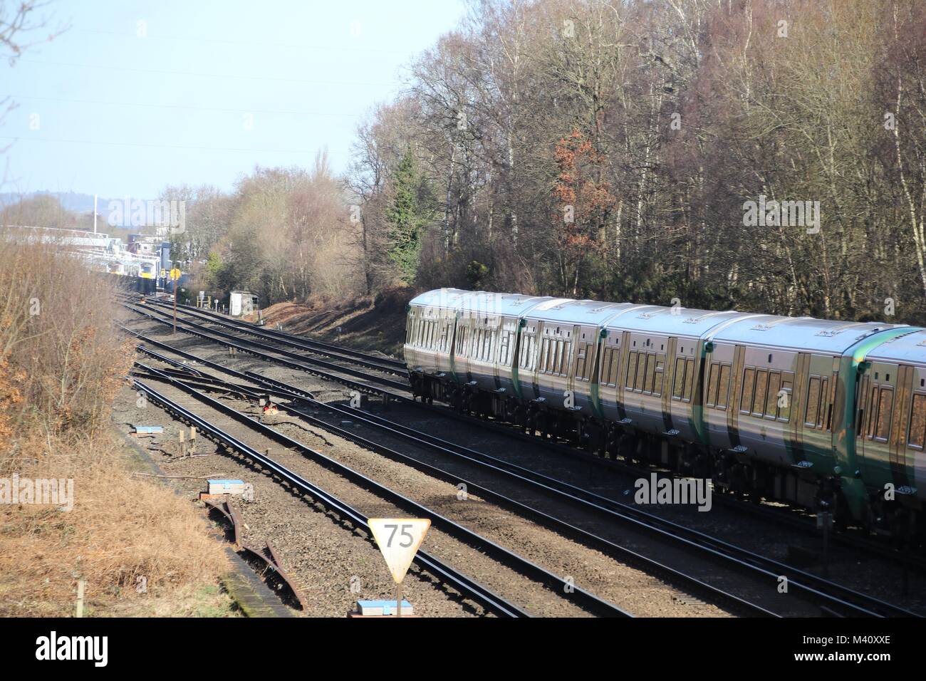A Southern train heading from Brighton towards Three Bridge station