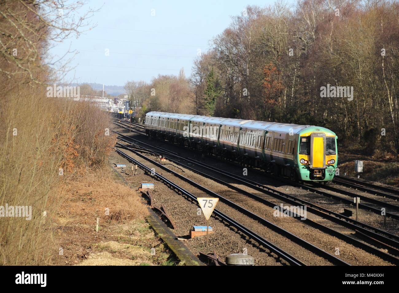 A Southern train heading from Brighton towards Three Bridge station near Crawley, Sussex Stock