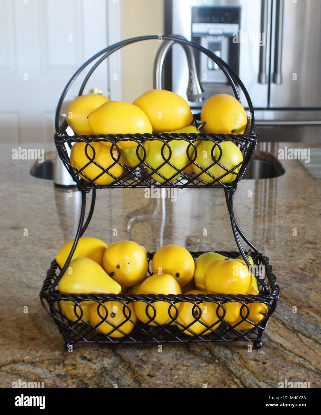 Two tiered wire basket hires stock photography and images Alamy