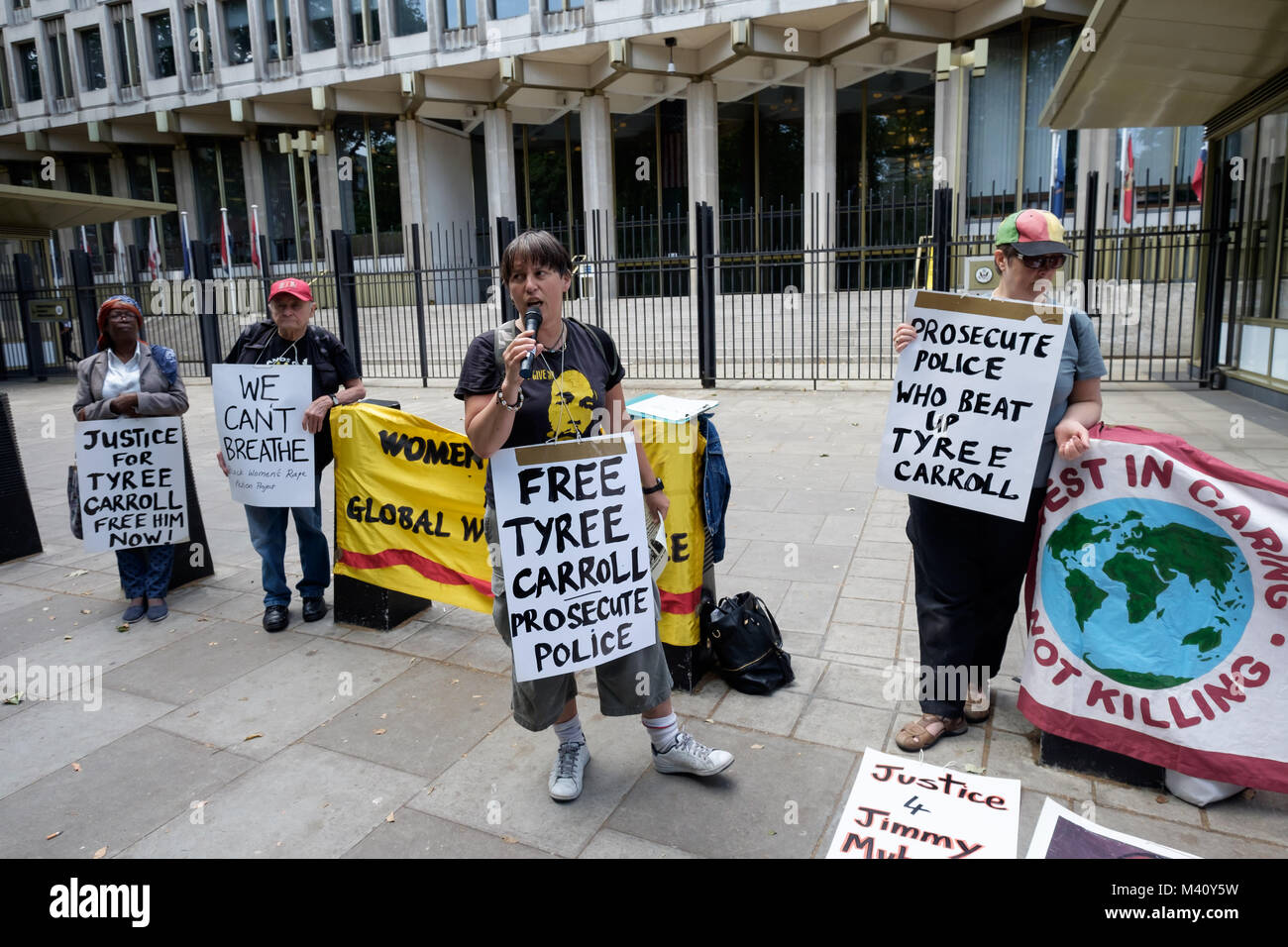A speaker at the protest against the arrested and brutal beating by