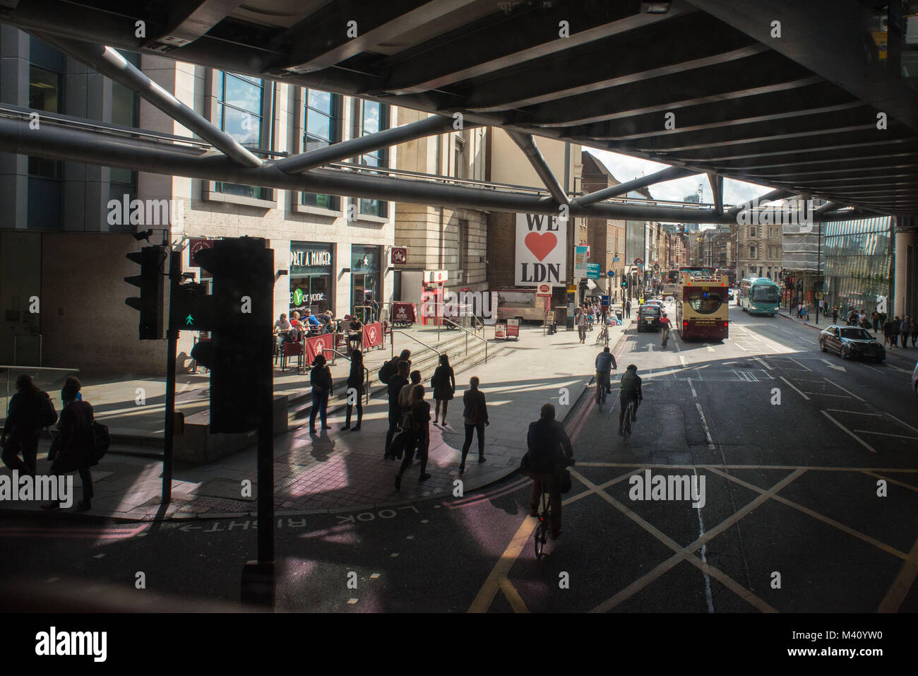 London, United Kingdom. Pedestrians cross through Southwark. Scene from the bus. Stock Photo