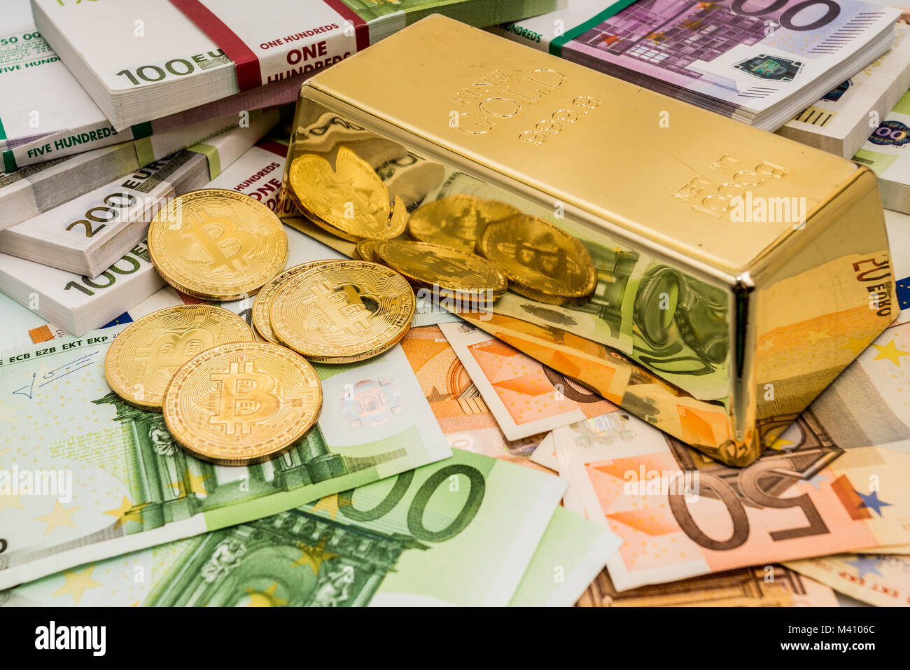 Gold Bitcoin BTC coins with bills of euro banknotes and gold bullion Stock  Photo - Alamy