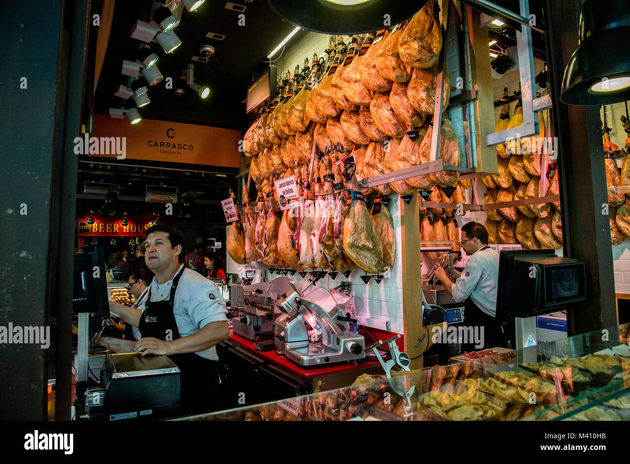 Iberico hams hangs in the ceiling of a Madrid restaurant on Cuesta San Vicente in central Madrid Stock Photo