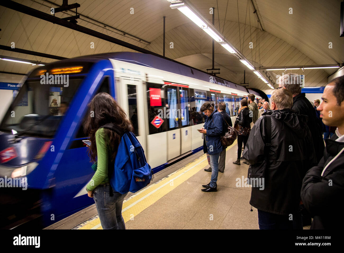 Madrid underground train with passengers Stock Photo