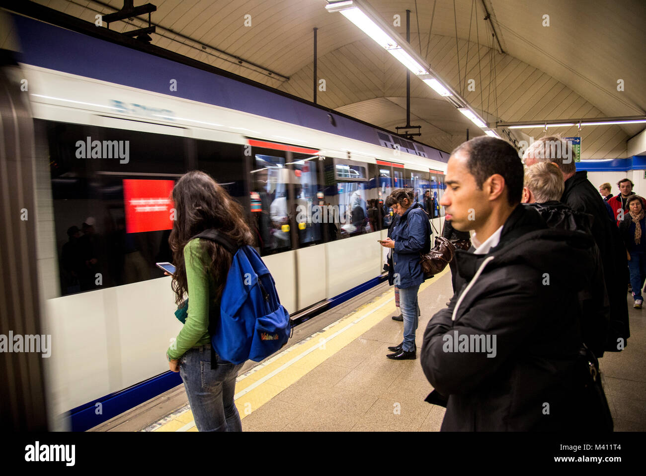 Madrid underground train with passengers Stock Photo