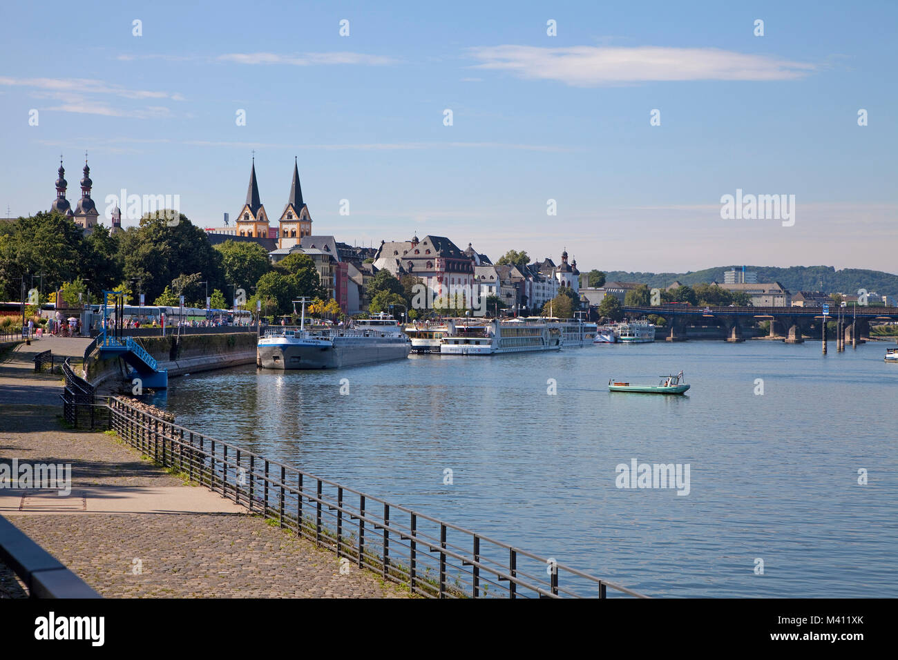 River cruise ships at Peter-Altmeier-Ufer, towers of old warehouses and Florins church, old town of Coblenz, Rhineland-Palatinate, Germany, Europe Stock Photo