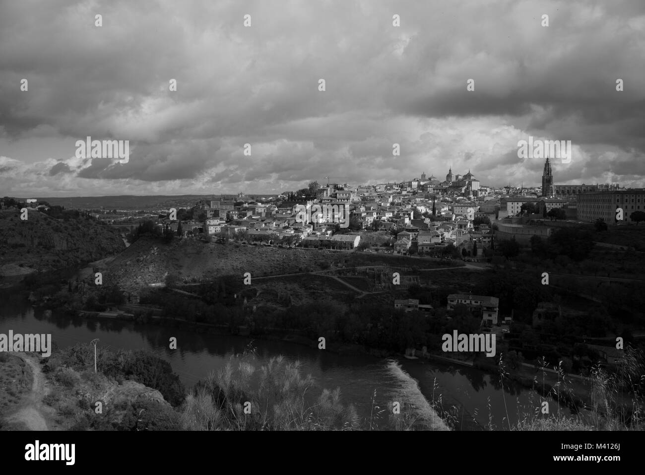 Panoramic view with dark clouds over former Spanich capital Toledo near Madrid in the Casilla - La Manch region Stock Photo