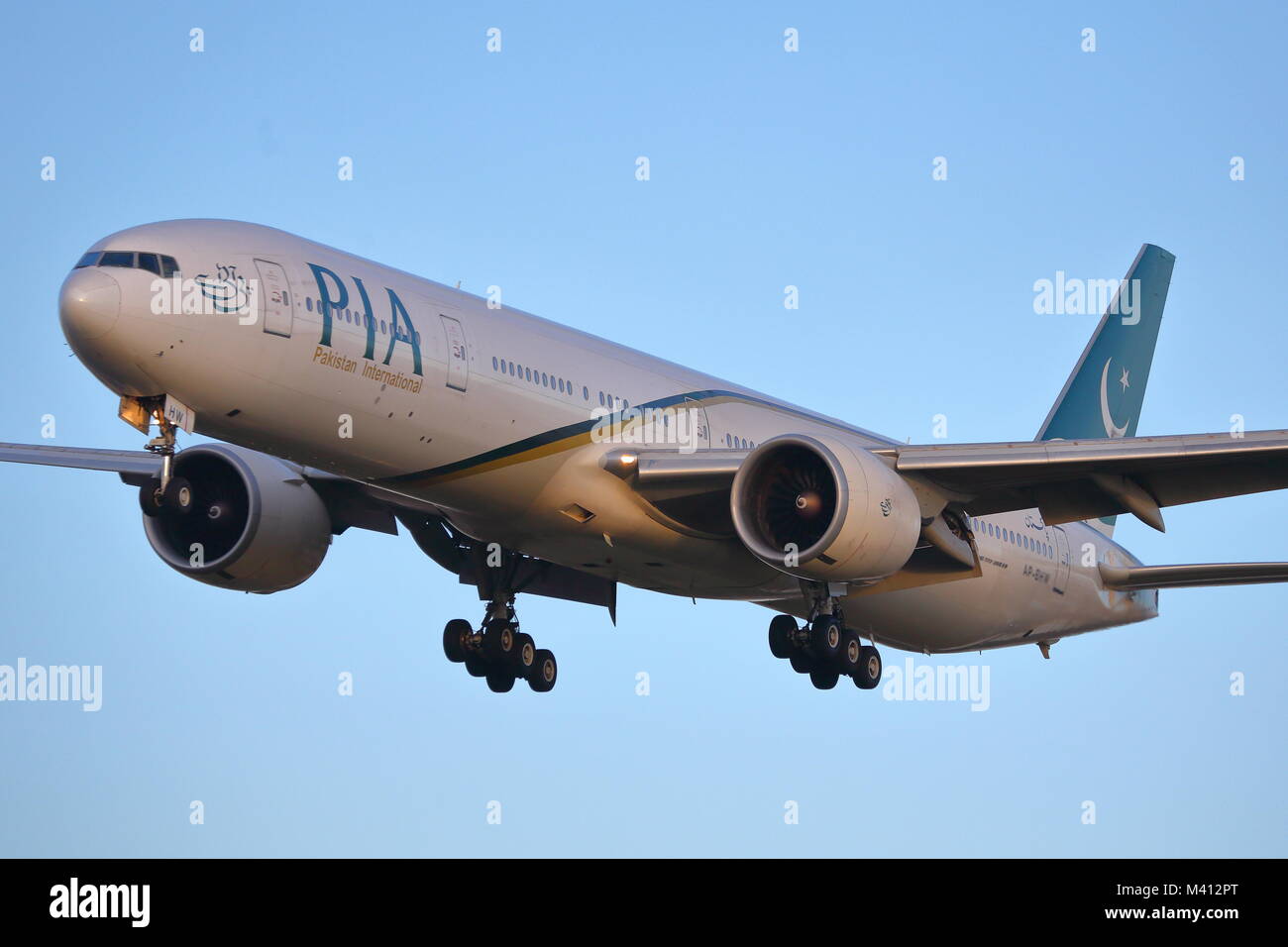 Pakistan IInternational Airlines Boeing 777 AP-BHW landing at London Heathrow Airport, UK Stock Photo