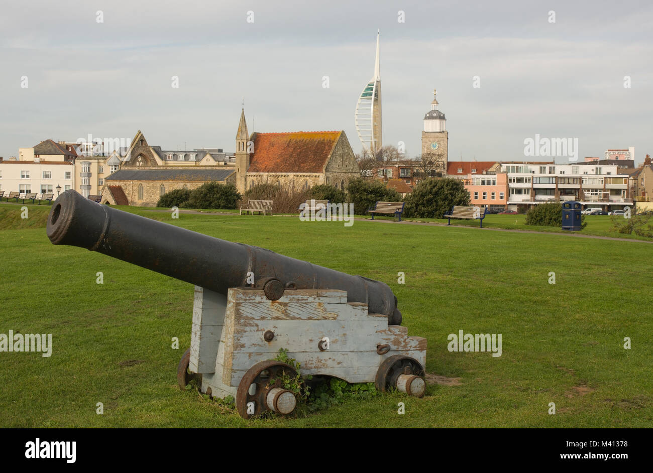 Old Naval Cannon at Entrance to Portsmouth Harbour in Hampshire, England. With Gunwharf Quays and Spinnaker Tower in background Stock Photo