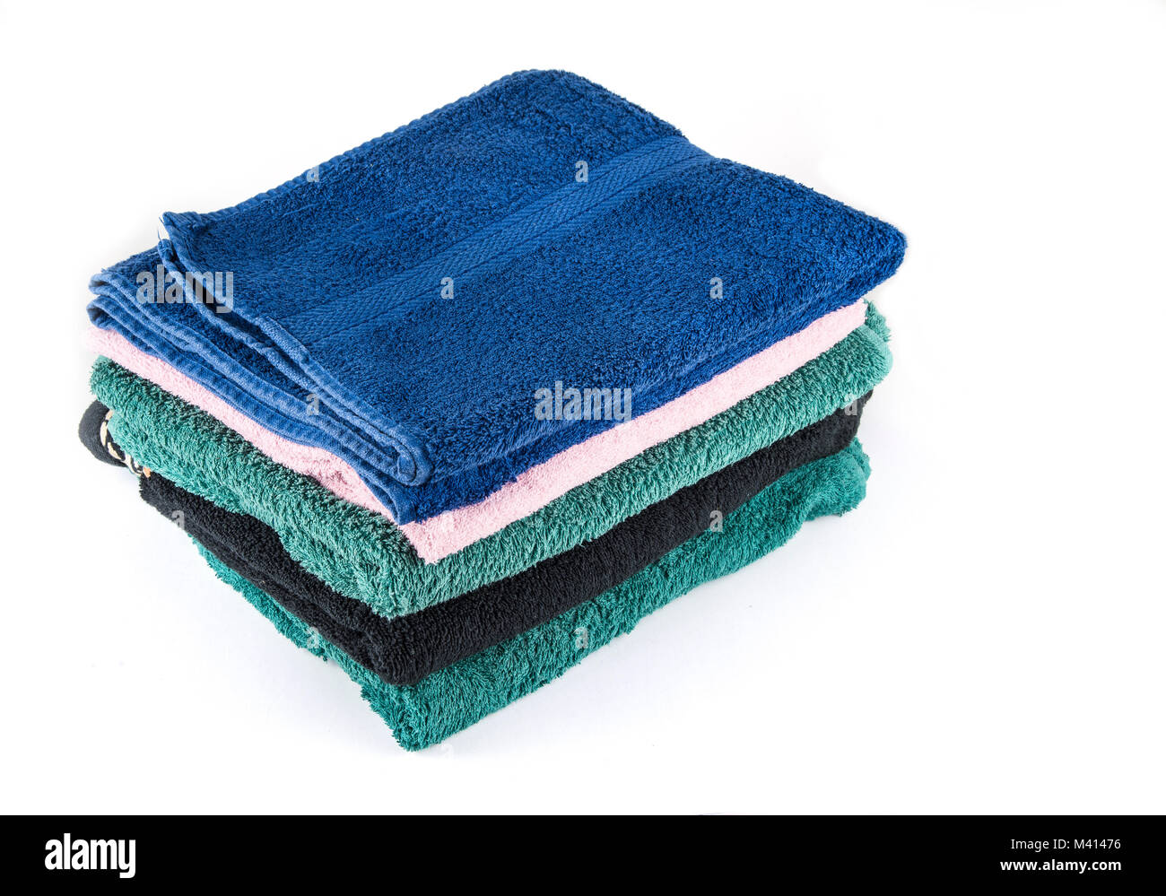Medium towels for the bathroom and bath. Bath towels are stacked. Stock Photo