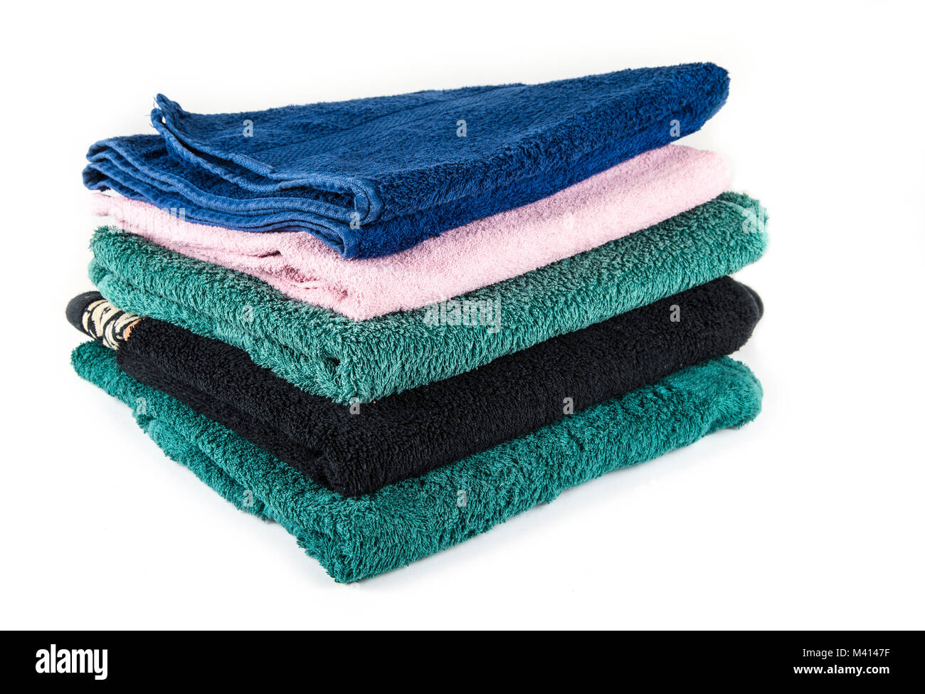 Medium towels for the bathroom and bath. Bath towels are stacked. Stock Photo