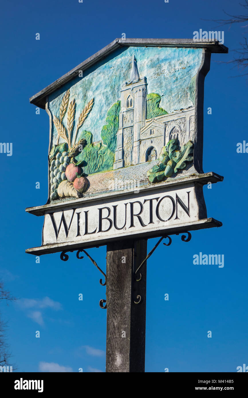 Village sign for Wilburton against a blue sky, Cambridgeshire, England