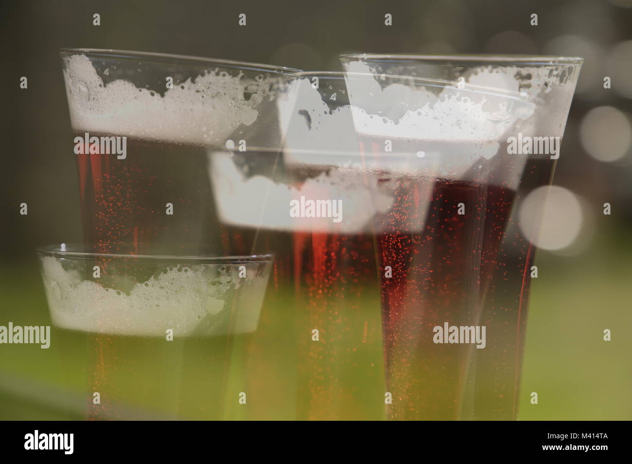 A glass of rose beer in double exposure Stock Photo Alamy