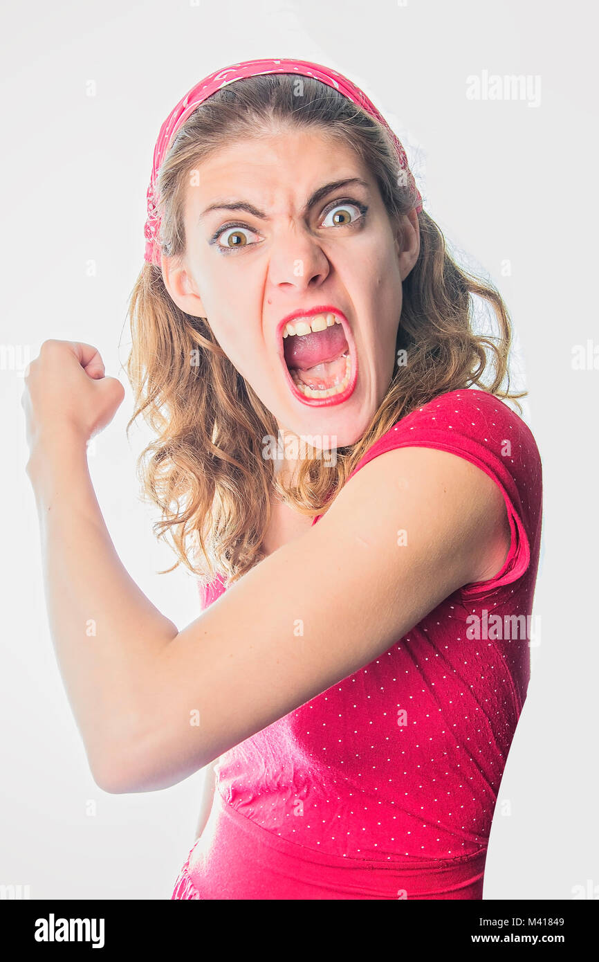 Angry young woman in red vintage dress Stock Photo