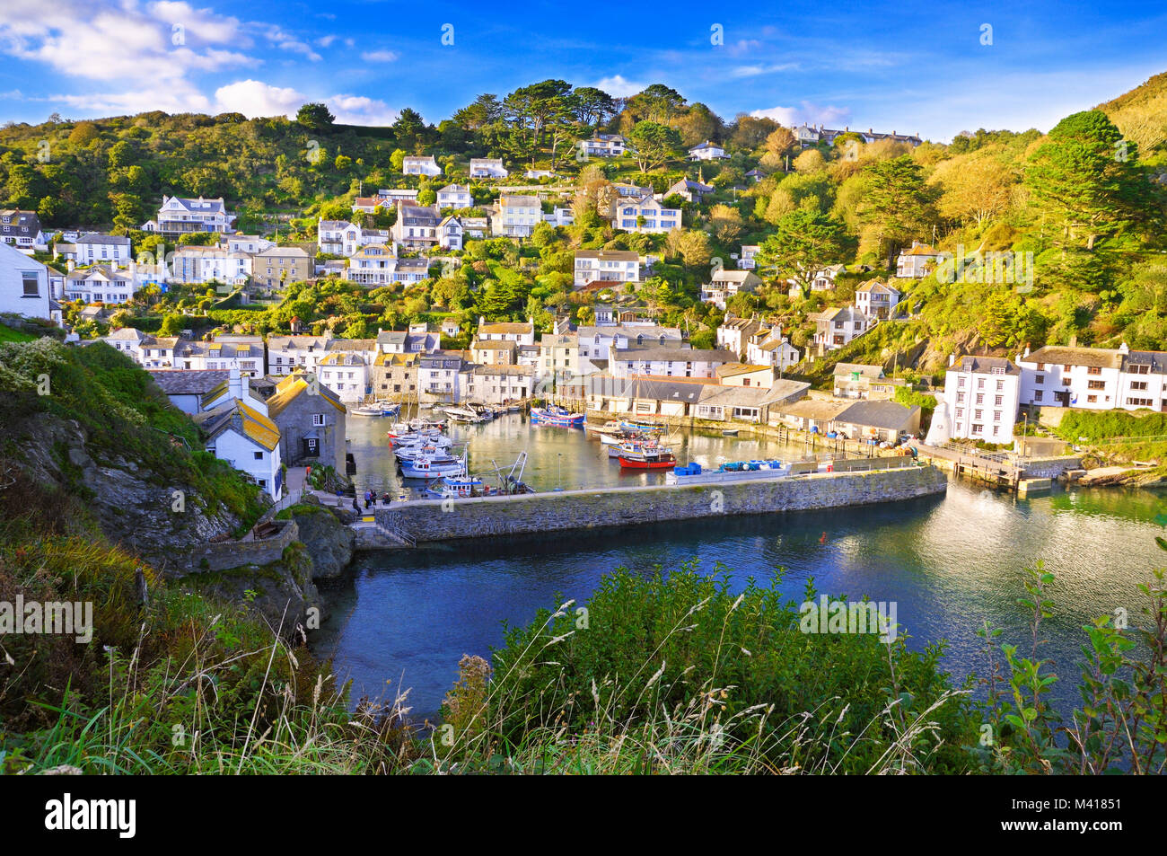 A summer view overlooking the pretty fishing village of Polperro in south east Cornwall. Stock Photo
