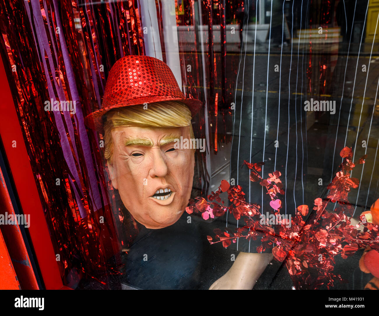 A rubber Donald Trump mask for sale in a novelty gift shop. Stock Photo