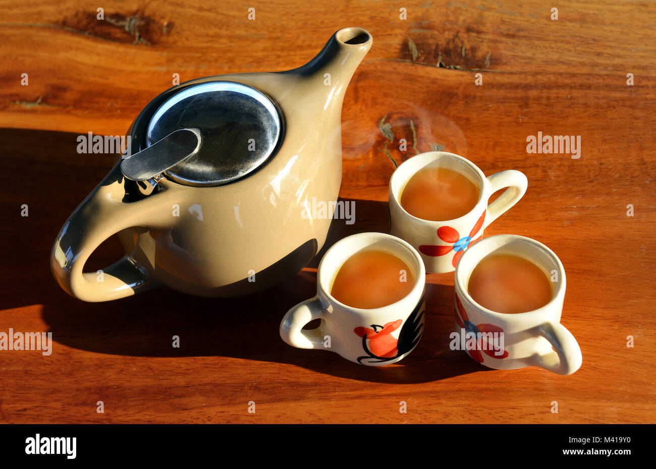 the lighting and shadow of morning tea time set at coffee shop Stock Photo