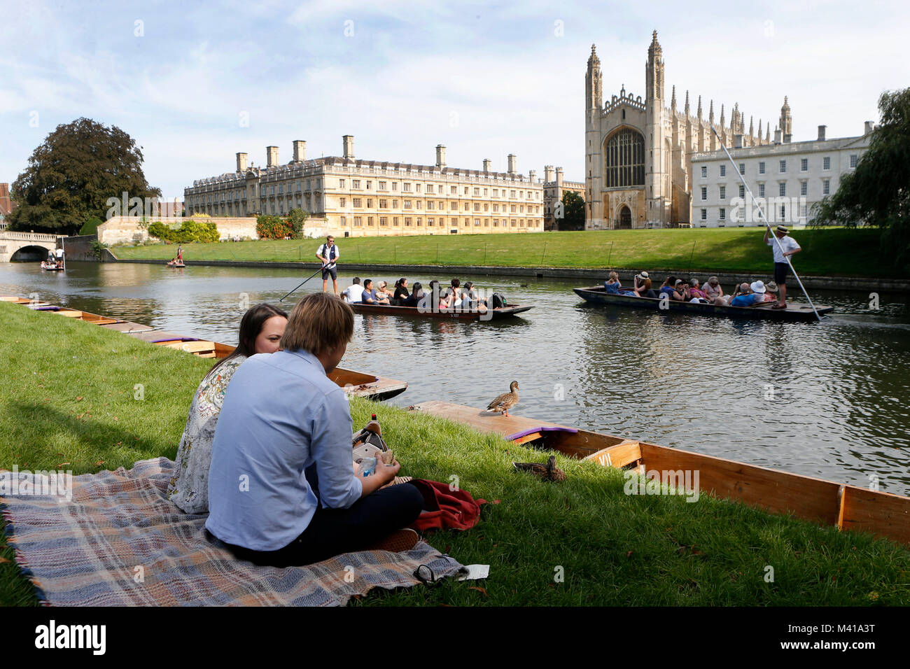 Tourists punting on the River Cam in Cambridge passing by Kings College Chapel Stock Photo