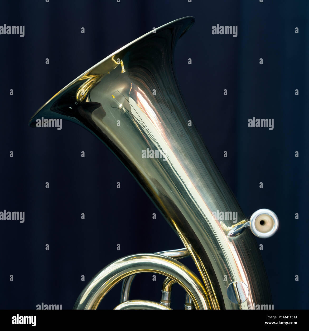 part of baritone brass instrument against dark background Stock Photo