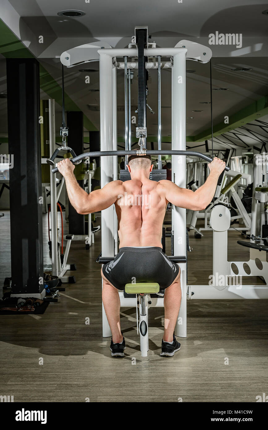 Shoulder pull down exercise Stock Photo - Alamy