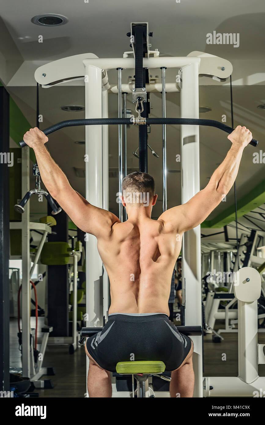 Shoulder pull down exercise Stock Photo Alamy