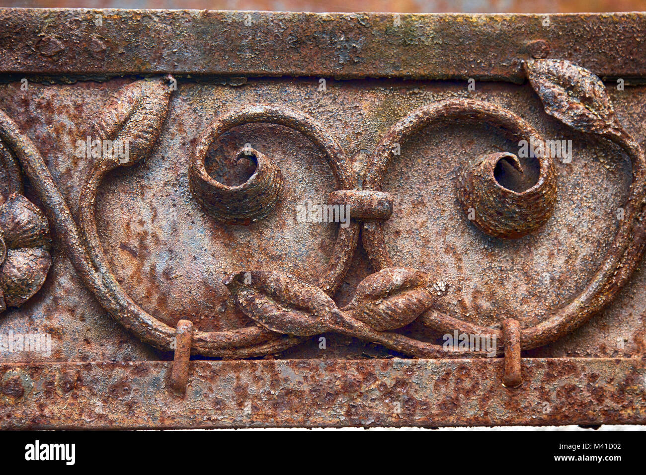 Everyday objects in the Museum and the abandoned old houses. Twisted Pattern (Arabesque) on the wrought iron gate. Old rusty metal, metal handicrafts Stock Photo