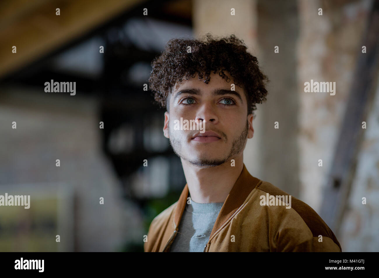 Multiracial young adult male looking to future Stock Photo