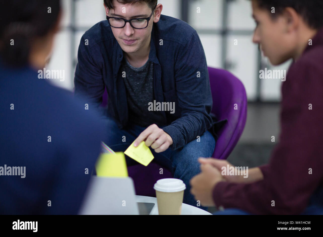 Student with sticky notes at college Stock Photo