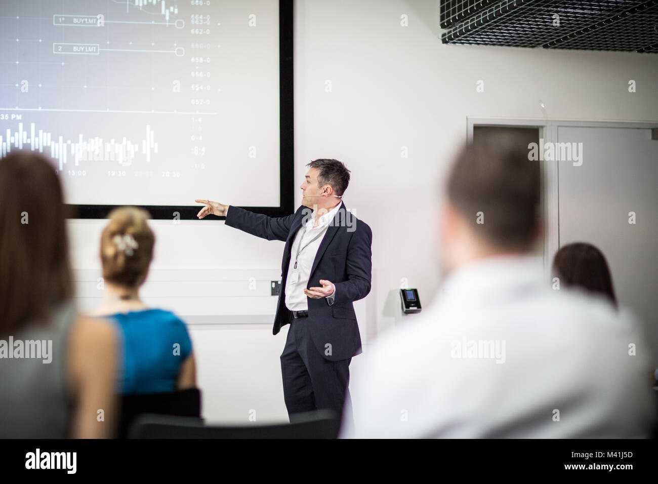 Businessman leading a training conference Stock Photo