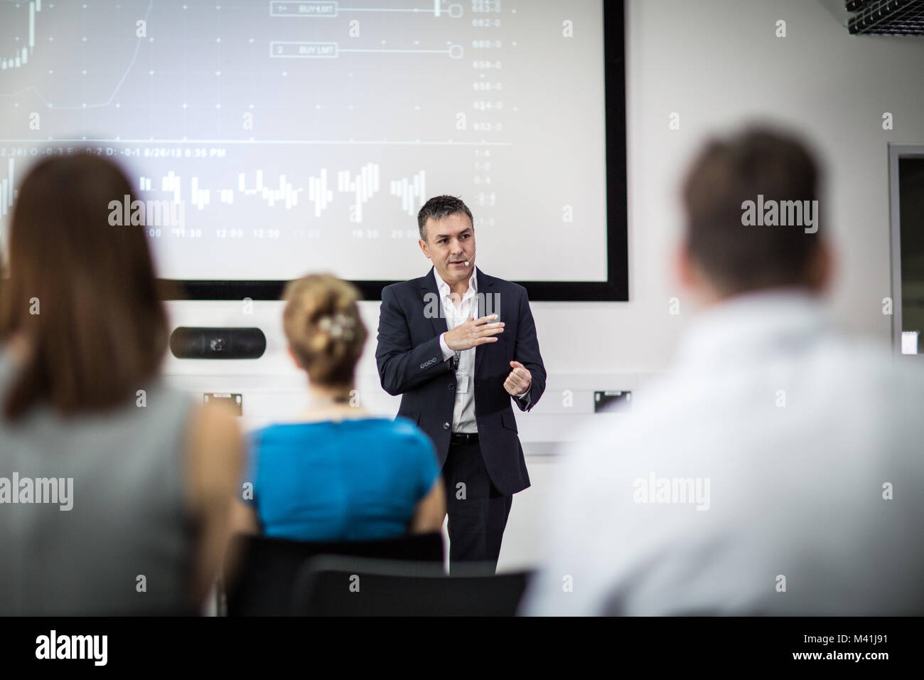 Businessman leading a training conference Stock Photo