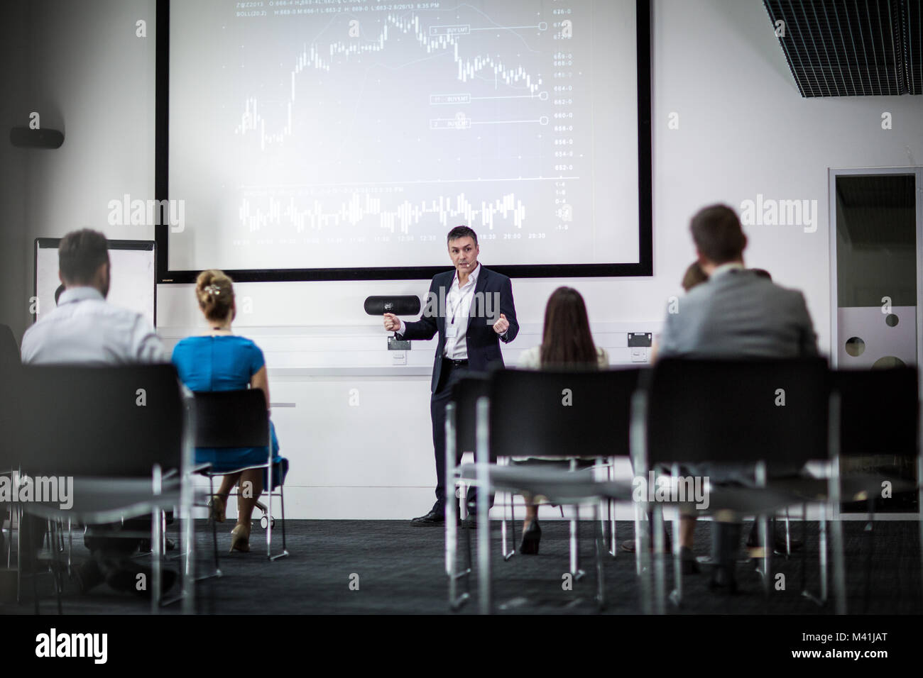 Businessman leading a training conference Stock Photo